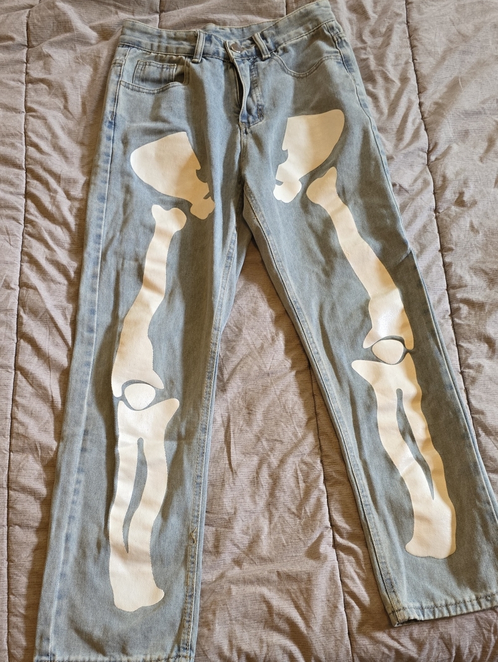 Light Blue Women’s Jeans with White Skeleton Print